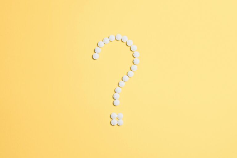 Question mark made of pills